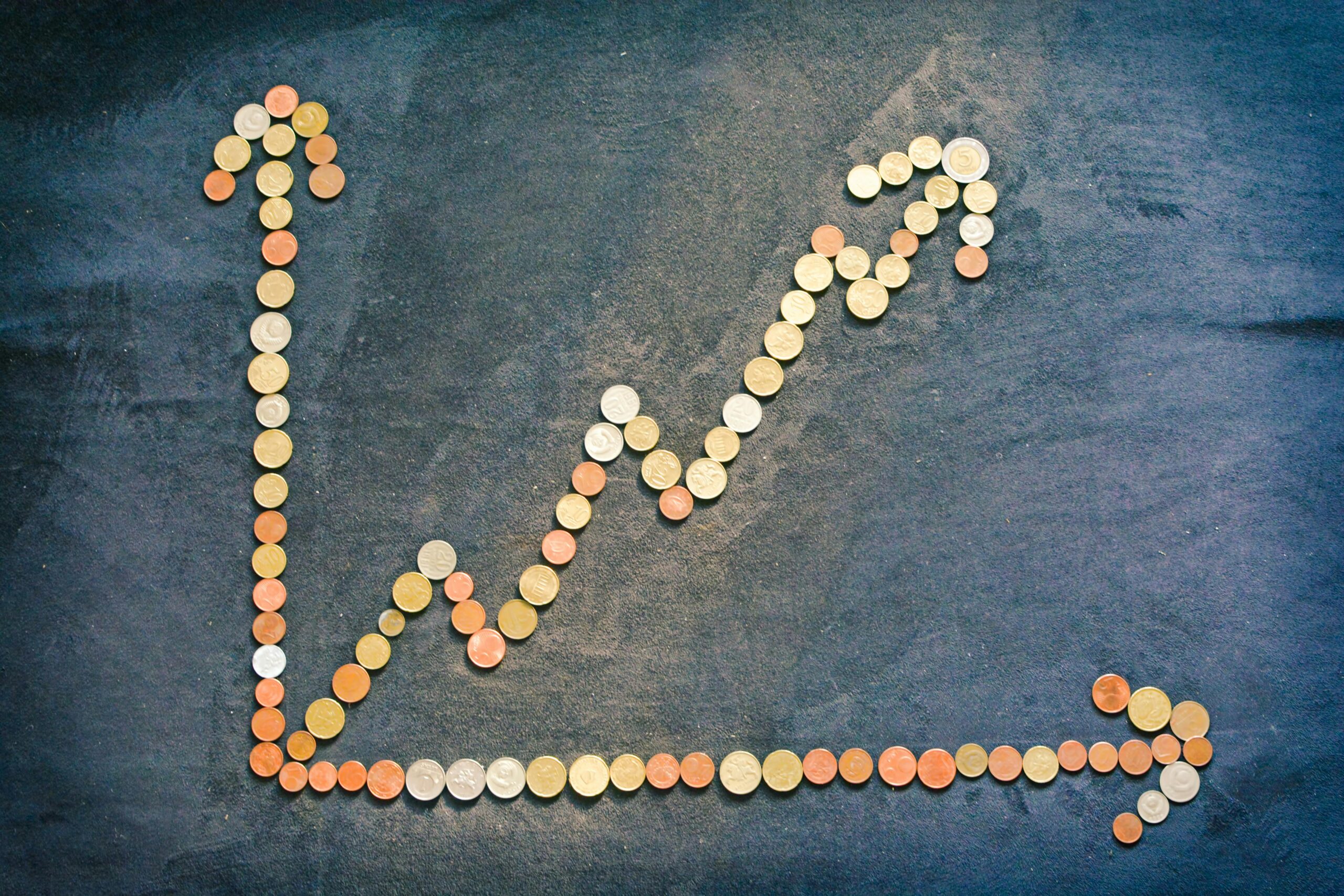 Upward trend of coins illustrating this month's Sensible Basket results
