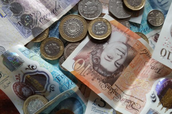 British pound coins and notes, illustrating the 1p savings challenge