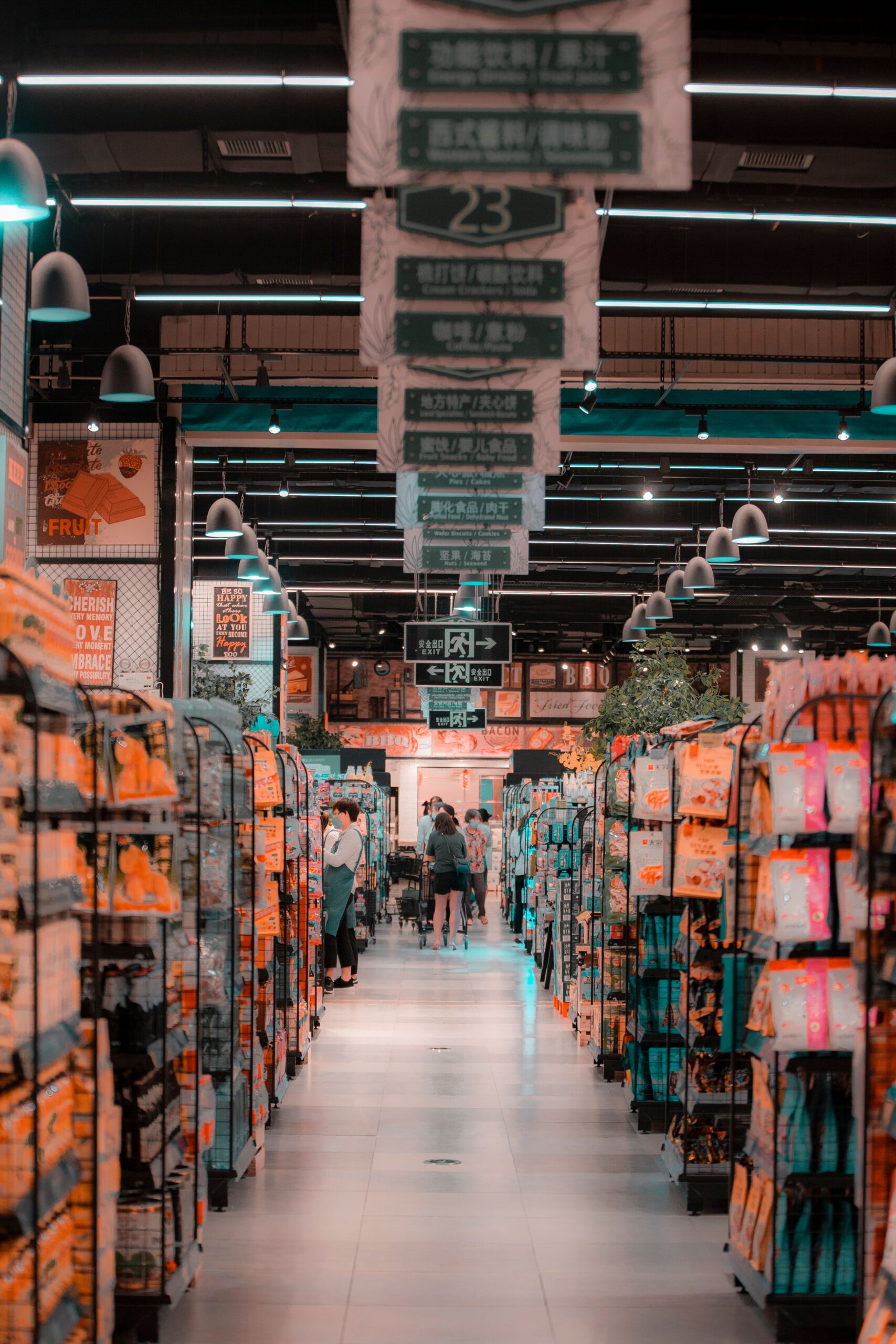 Shoppers browsing a supermarket aisle
