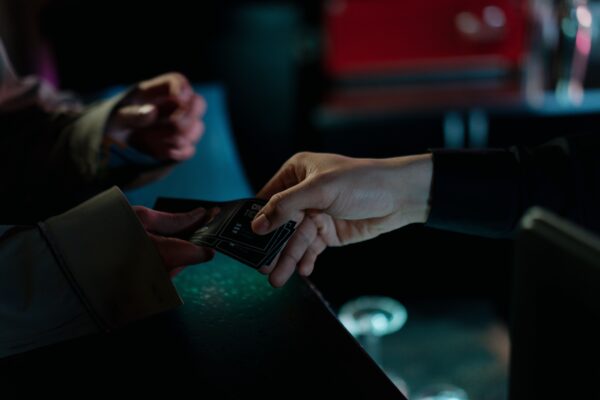 Hands exchanging cinema tickets, National Cinema Weekend 2026